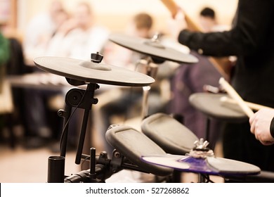 Man's Hands Playing Electronic Drums