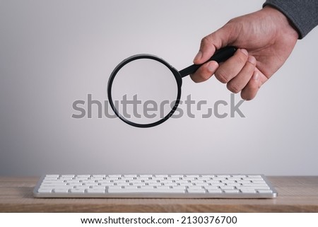 man's hands are using a computer keyboard to Searching for information. Using Search Console with your website. Data Search Technology Search Engine Optimization. Online business search a job for work