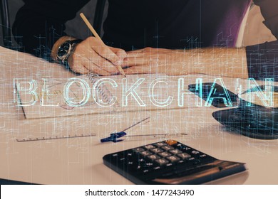 Man's hands working with notes background. Cryptocurrency and finance concept.