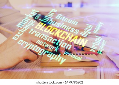Man's hands working with notes background. Cryptocurrency and finance concept.
