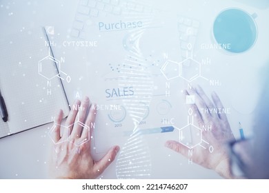 Man's hands working with notes background. Genetic engineering and gene manipulation concept. Double exposure.