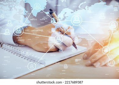 Man's hands working with notes background. Social networking concept. Crowd sourcing. Global business. Multi exposure.