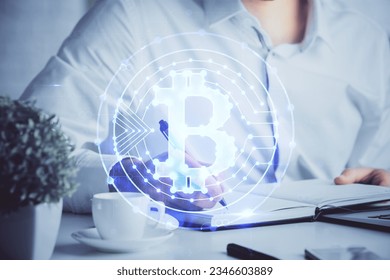 Man's hands working with notes background. Cryptocurrency and finance concept. Double exposure.