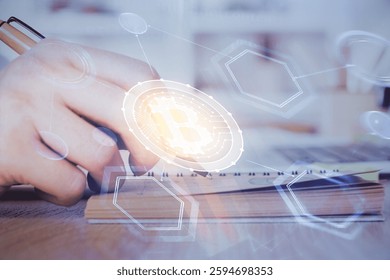 Man's hands working with notes background. Cryptocurrency and finance concept. Double exposure.