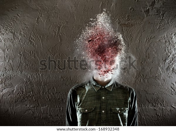 A man\'s head exploding. There is red\
in the middle and then some white on the\
edges.