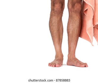 A Man's Naked Legs Standing With Towel