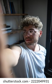 Mans Portrait In Modern Home Library, Taking A Selfie