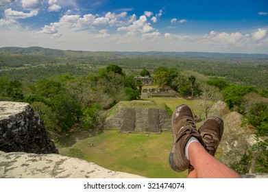 Man's Shoes Overlooking Xunantunich Maya Site Ruins In Belize Caribbean
