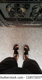 Man's Slippers Waiting In Front Of Door