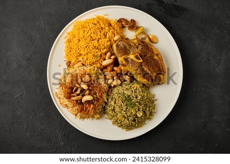 Mansaf al-Quzi mandi rice with nuts and meat.(Iraqi cousin) [[stock_photo]] © 