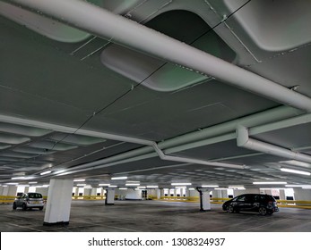 MANSFIELD, ENGLAND - FEBRUARY 1, 2019: Interior Of A Modern, Concrete, Brutalist, Multi-storey Car Park In Mansfield, UK