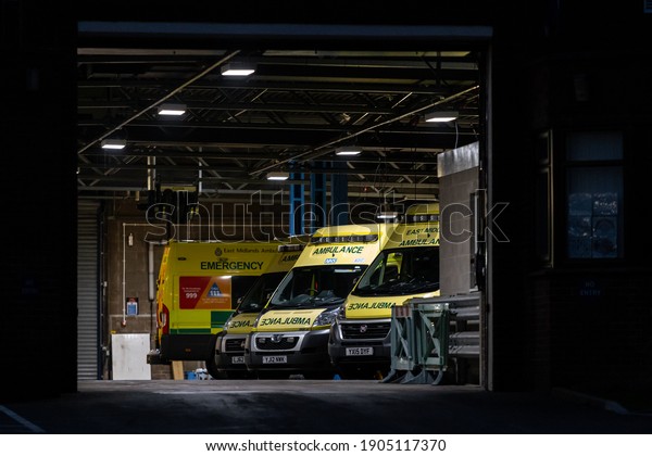 Mansfield Nottingham UK January 29th 2021 NHS
Ambulance station with fleet of clean ambulances parked waiting for
emergency incident response to accident and emergency during
pandemic blue light