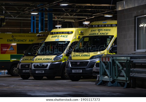 Mansfield Nottingham UK January 29th 2021 NHS\
Ambulance station with fleet of clean ambulances parked waiting for\
emergency incident response to accident and emergency during\
pandemic blue light