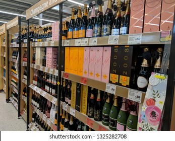 MANSFIELD, UK - FEBRUARY 14, 2019:  Supermarket shelves filled with many different types of Champagne and other sparkling wine,on Valentine's Day (February 14th)  