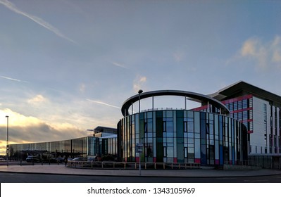 MANSFIELD, UK - MARCH 16, 2019:  Exterior Of The Steel & Glass Front Of Kings Mill Hospital In Dark Twilight, Refurbished & Remodeled In 1960s Style Under Tony Blair's Government