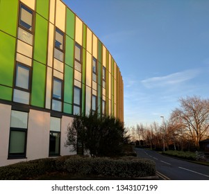 MANSFIELD, UK - MARCH 16, 2019:  Exterior Of The Steel & Glass Front Of Kings Mill Hospital In Dark Twilight, Refurbished & Remodeled In 1960s Style Under Tony Blair's Government