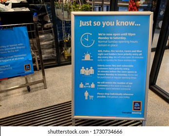 MANSFIELD, UK - MAY 14, 2020: Blue Sign Explaining Key Worker / Vulnerable People Priority, Single Shopper And Social Distancing Rules Enforced During COVID-19 Pandemic At An Aldi Supermarket 