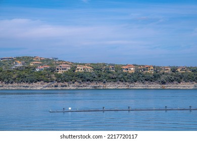 Mansions On A Slope With Lake Austin Waterfront- Austin, Texas. Rich Neighborhood Near The Lake With Mansions And Villas On A Sloped Land Against The Sky.