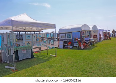 MANTEO, NORTH CAROLINA - AUGUST 19 2019: Vendors And Shoppers At The 38th Annual New World Festival Of The Arts, A Juried Outdoor Festival For Fine Art And Crafts On The Manteo Waterfront Every August