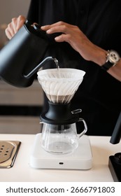 Manual coffee brewing method, using a pour over filter funnel and filter paper