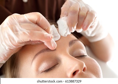 Manual Facial Cleansing.
Cleansing Facial Skin, Beautician Squeezed Blackheads. 