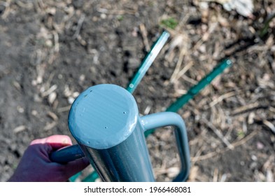 Manual Fence Post Driver That Is Used By Placing Over A Metal Rod And Slamming Down Until The Proper Depth Is Reached.