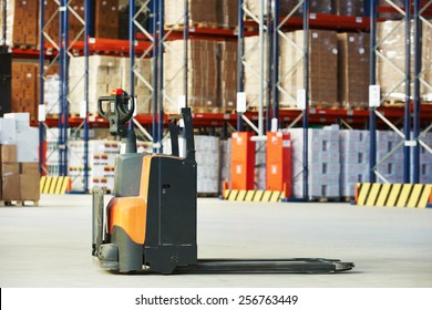 Manual Forklift Pallet Stacker Truck Equipment At Food Warehouse