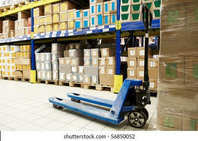 Manual Forklift Pallet Stacker Truck Equipment At Food Warehouse