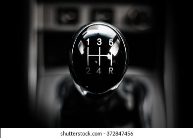 manual gearbox in the car macro black - Shutterstock ID 372847456