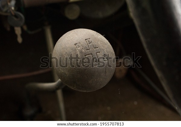 Manual\
gearbox handle in the old car. Manual gear\
shifter