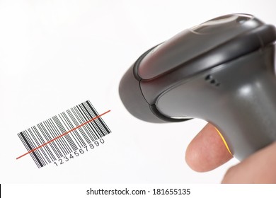 The Manual Scanner Of Bar Codes In Man Hand