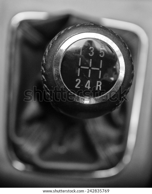 A manual shift\
of modern car gear shifter 