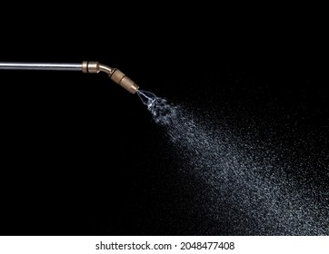 Manual Sprayer Hand Pressure Pump Sprayer with water splash against on black background