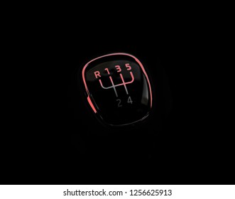 Manual Transmission Gear Shift, On Dark Backgroun With Red Light. Close-up