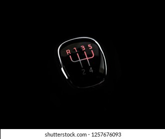 Manual Transmission Gear Shift, On Dark Backgroun With Red Numbers. Close-up