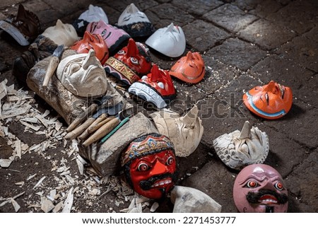 Manual work, making wooden masks of Sundanese tribe in West Java, Indonesia, traditional, sculpt and carve tools