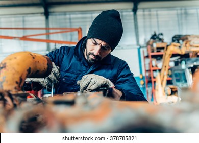 Manual Worker On A Workshop