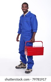 Manual Worker With A Red Toolbox