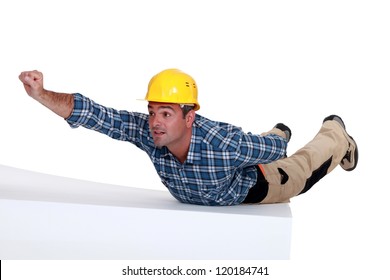 Manual Worker In Superman Pose