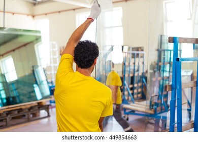 Manuel Worker Assembling PVC Doors And Windows. Factory For Aluminum And PVC Windows And Doors Production.