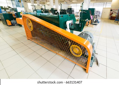Manufacture of aluminum wire. Machine for processing wire, V-belt drive. Protective fence.