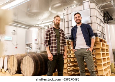 manufacture, business and people concept - men at craft brewery or beer plant - Powered by Shutterstock