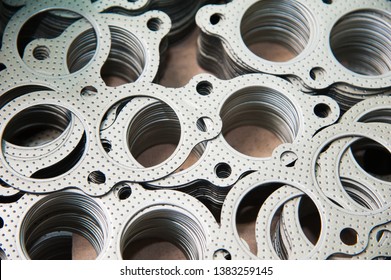 Manufacture Of Cylinder Head Gaskets For Automobile Engines