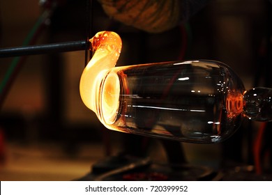 Manufacture Of Glassware /
Someone Is Manufacturing Glass Products.