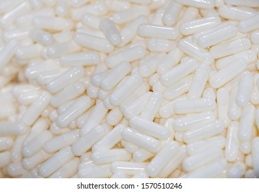 Manufacture Of Medical Capsules. White Pills. Pharmaceutical Factory. Warehouse Of Medicaments. Technology Of Drugs Manufacturing. Dietary Supplement. Medical Research