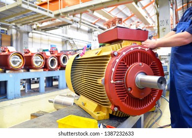 manufacture of modern electric motors in an industrial company - construction and assembly workers 