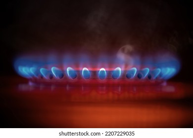 Manufactured Fuel Gas And Dollar Sign In Smoke. 
Manufactured Fuel Gas Also Called Town Gas Or Coal Gas.