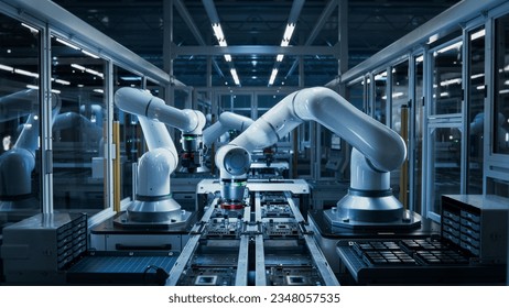 Manufacturing Automation. Advanced High Precision Robot Arms on Automated PCB Assembly Line Inside Modern Electronics Factory. Electronic Devices Production Industry. Component Installation Process.