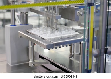 Manufacturing equipment in modern pharmaceutical factory. Selective focus.