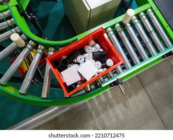 Manufacturing Line. Box With Plastic Parts On Conveyor. Modern Manufacturing Line. Top View Of Manufacturing Line. Concept Of Improving Production Processes. Industrial Conveyor. Selective Focus